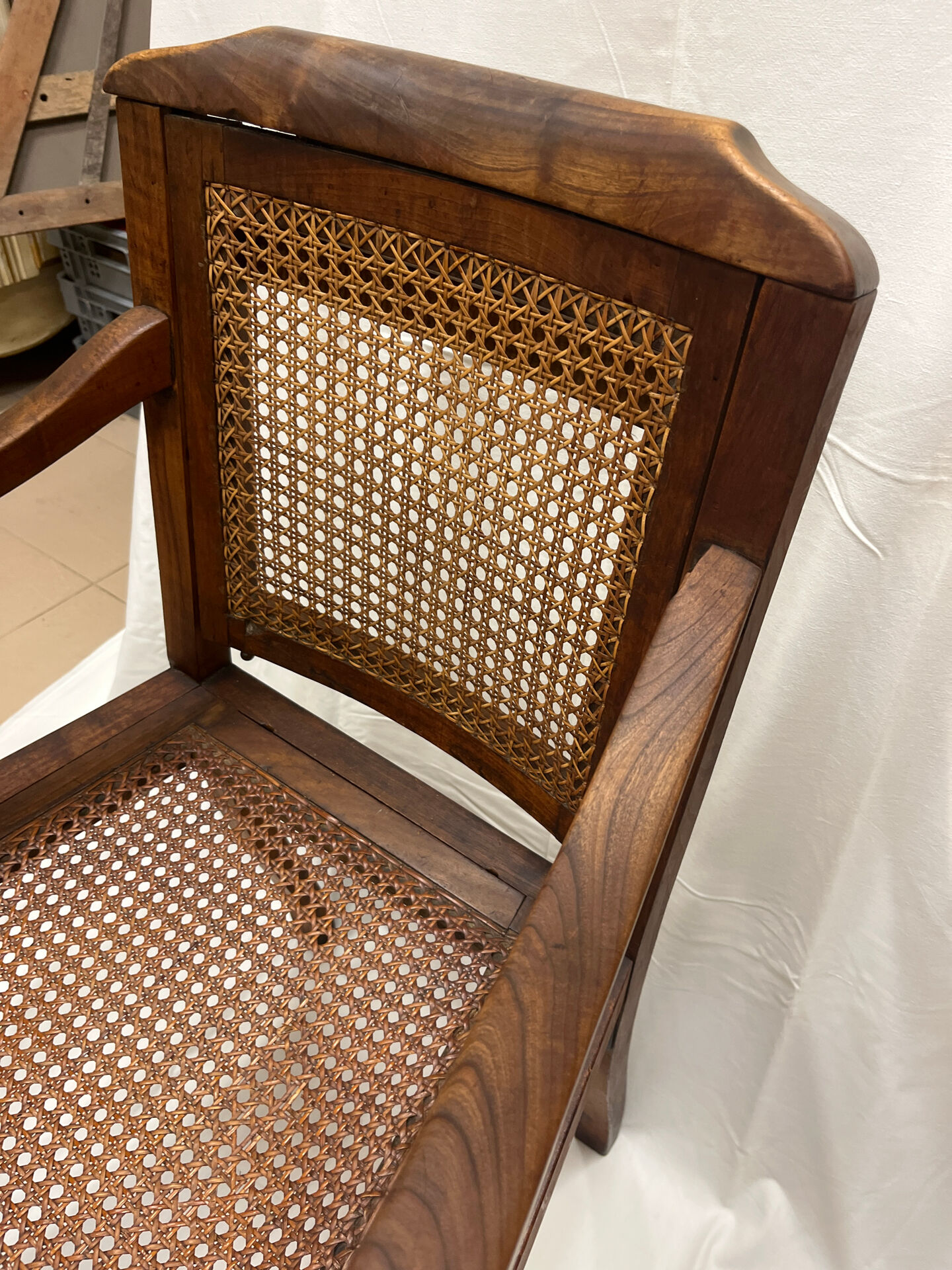 Caned armchair