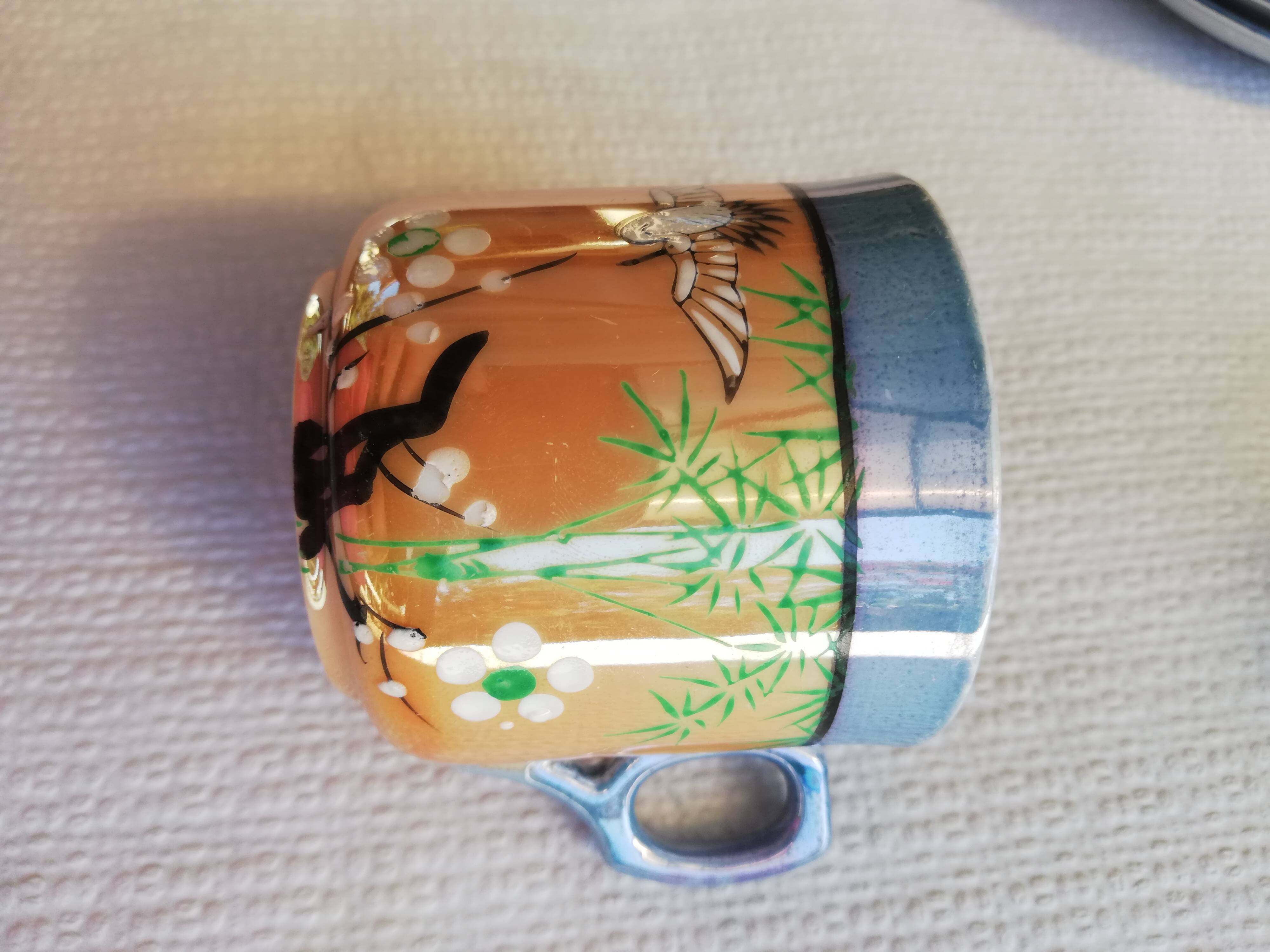 Fine porcelain cups with Japanese decor
