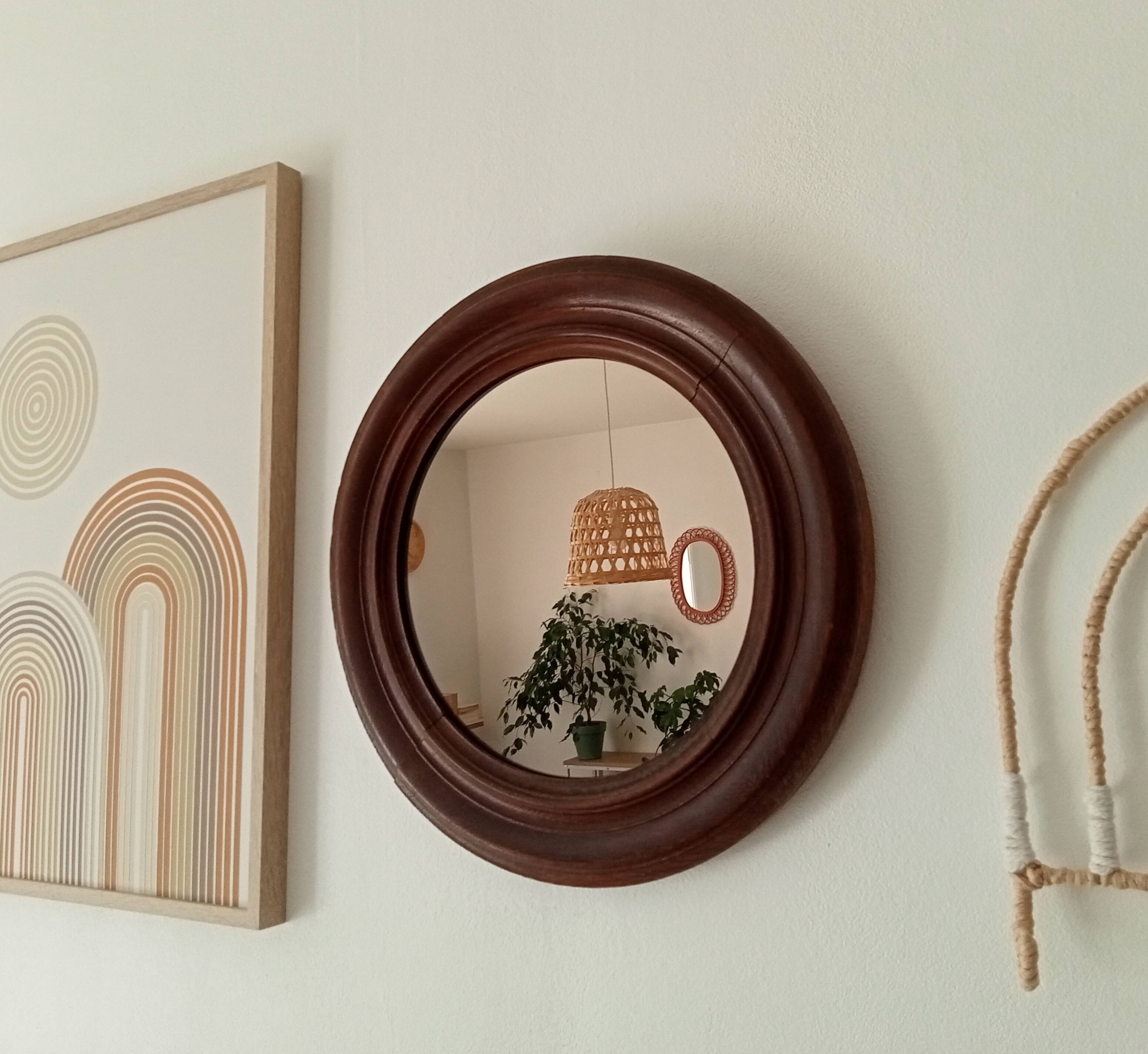 Antique round wooden mirror