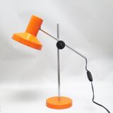 Orange articulated desk lamp from the 1970s