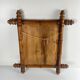 Wooden turned mirror in bamboo style, circa 1900-1930.