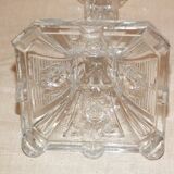 19th century candlestick in molded glass decorated with roses and lions