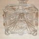 19th century candlestick in molded glass decorated with roses and lions