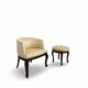 An antique Italian bar chair and a matching tufted vanity stool.