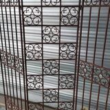 Screen partition wall made of glass and wrought iron