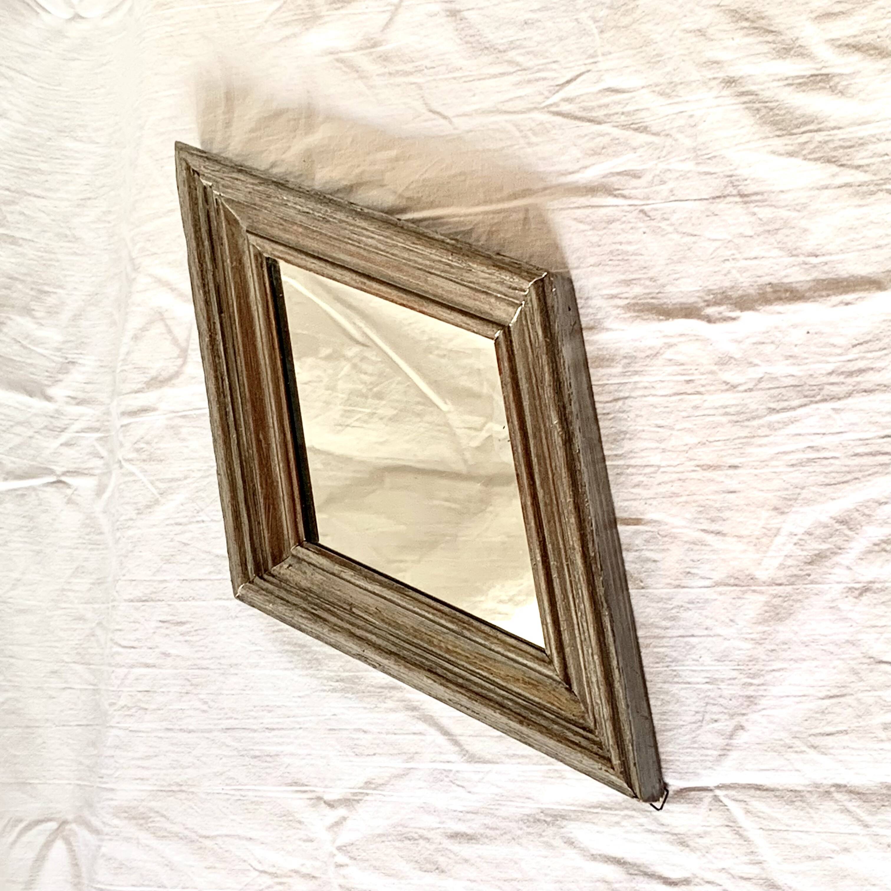 Small vintage wooden diamond wall mirror