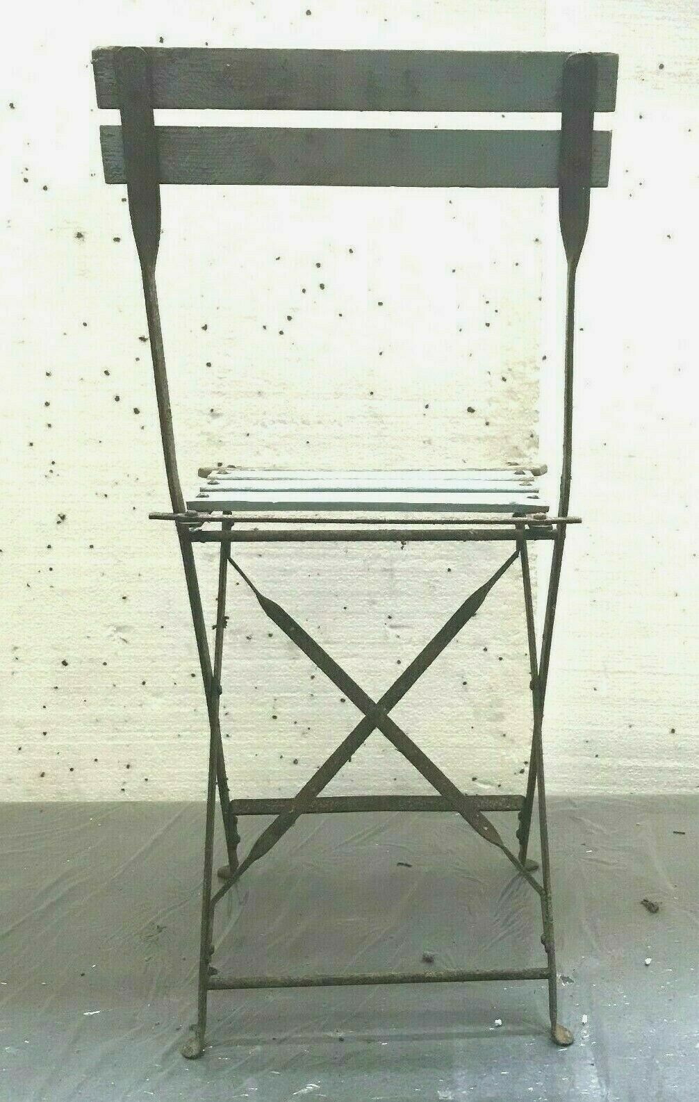 Folding chairs in iron and wooden blade XX century