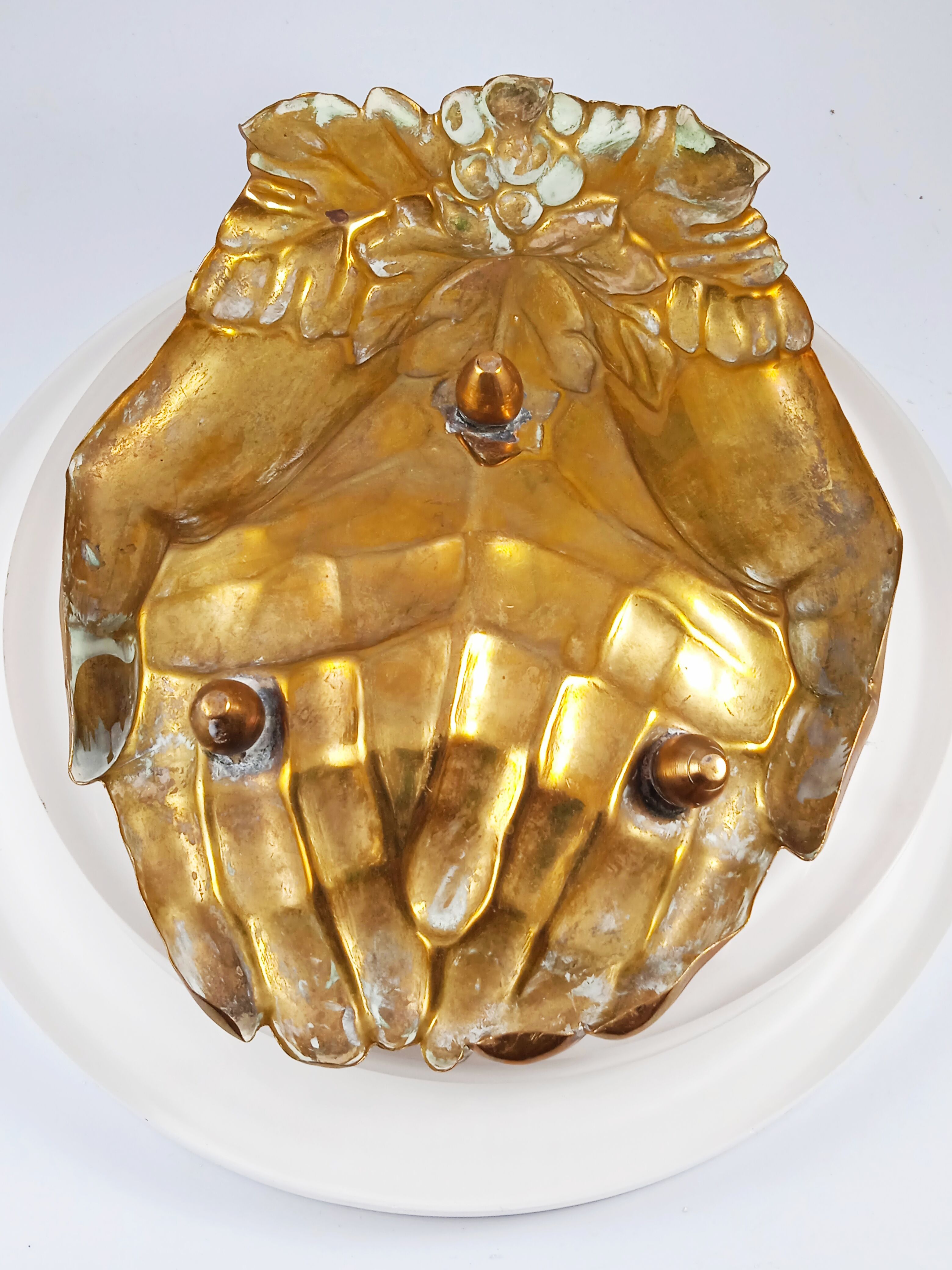 Antique hand-shaped brass soap holder