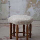 Modern Danish, a hexagonal oak stool, seat reupholstered in lambswool, 1950s.