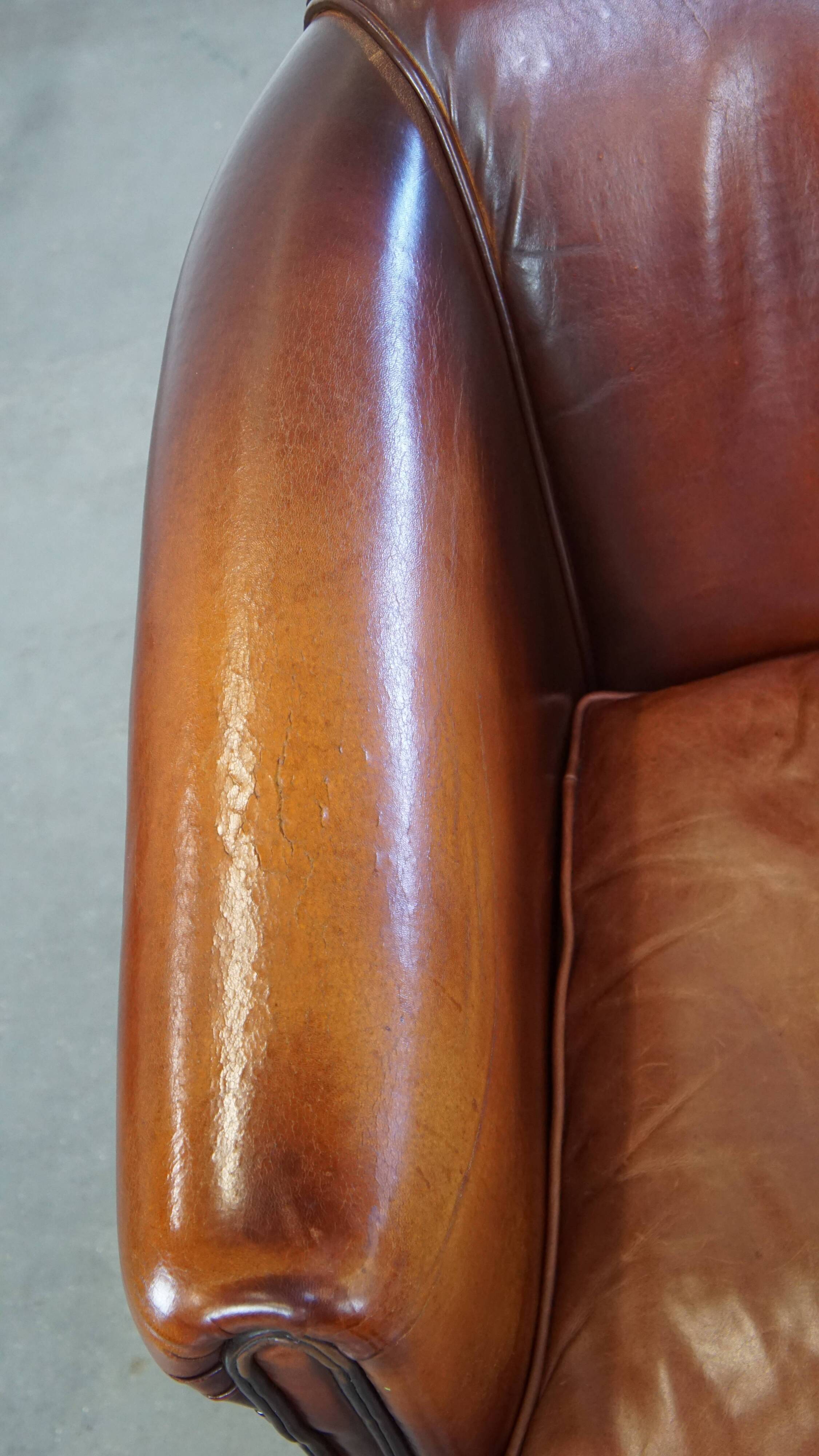 Correctly finished sheep leather club chair