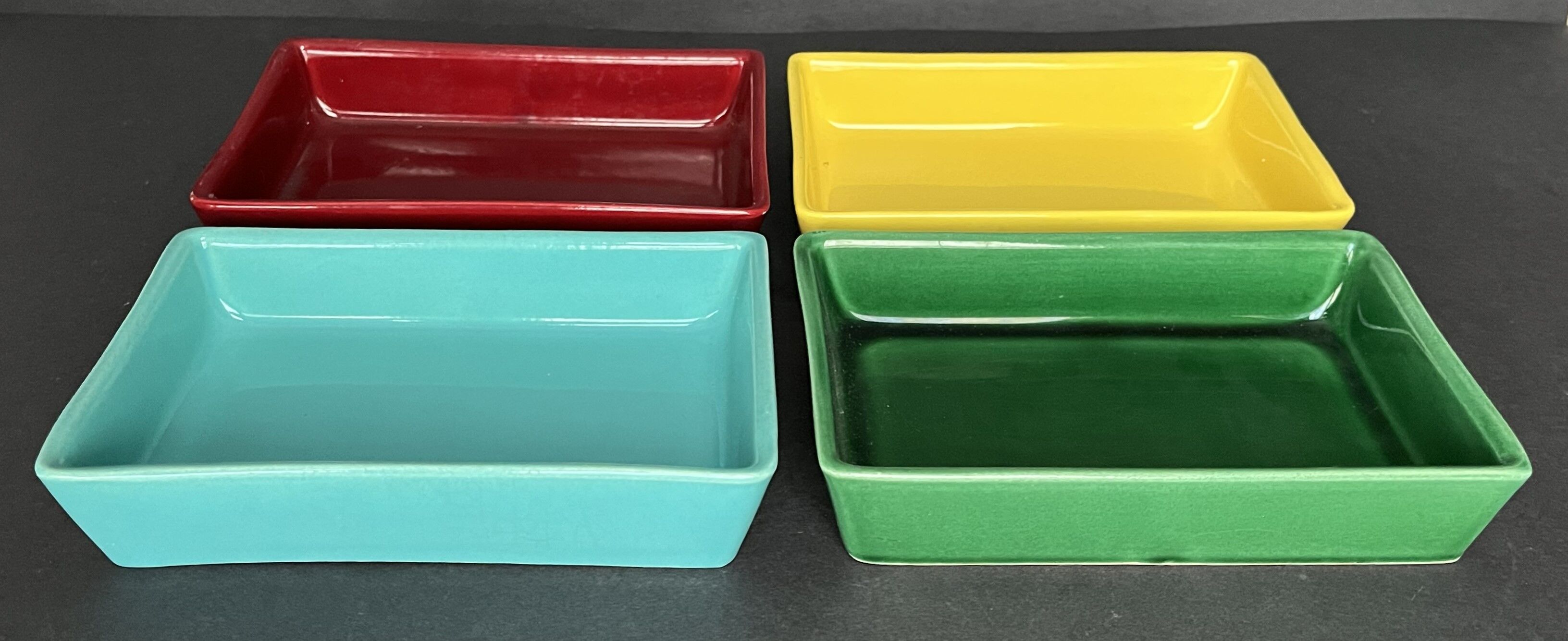 4 multicolored earthenware raviers