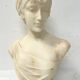 Sculpted marble group of a young woman's bust, 20th century.