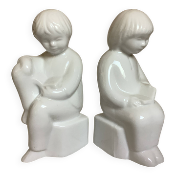 Pair of bookends featuring children reading from the 1970s.