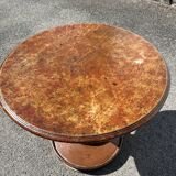 Antique pedestal table — wooden top and wrought iron legs