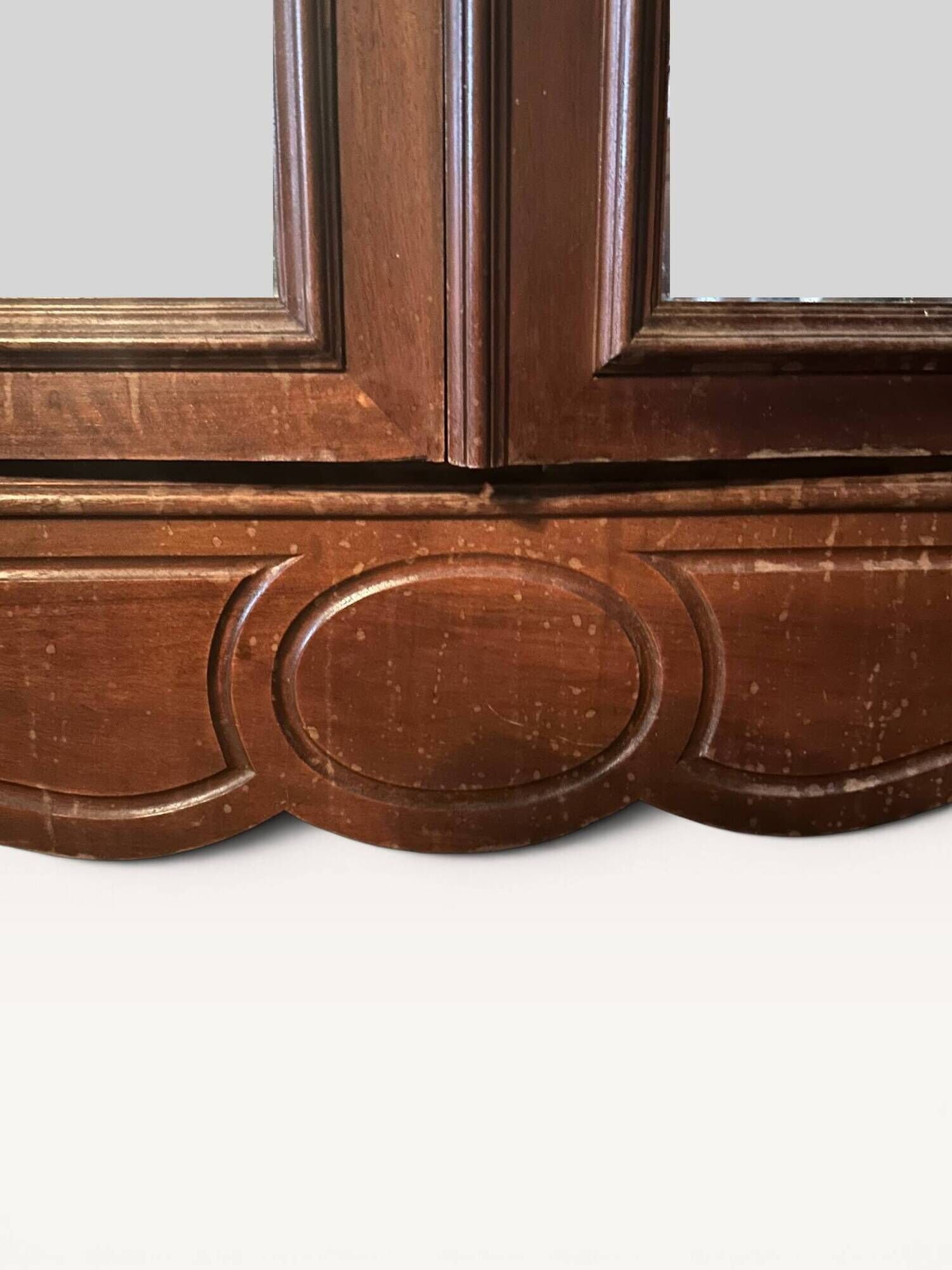 Louis XV style armoire with two bevelled mirror doors.