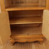 Art deco showcase in waved sycamore