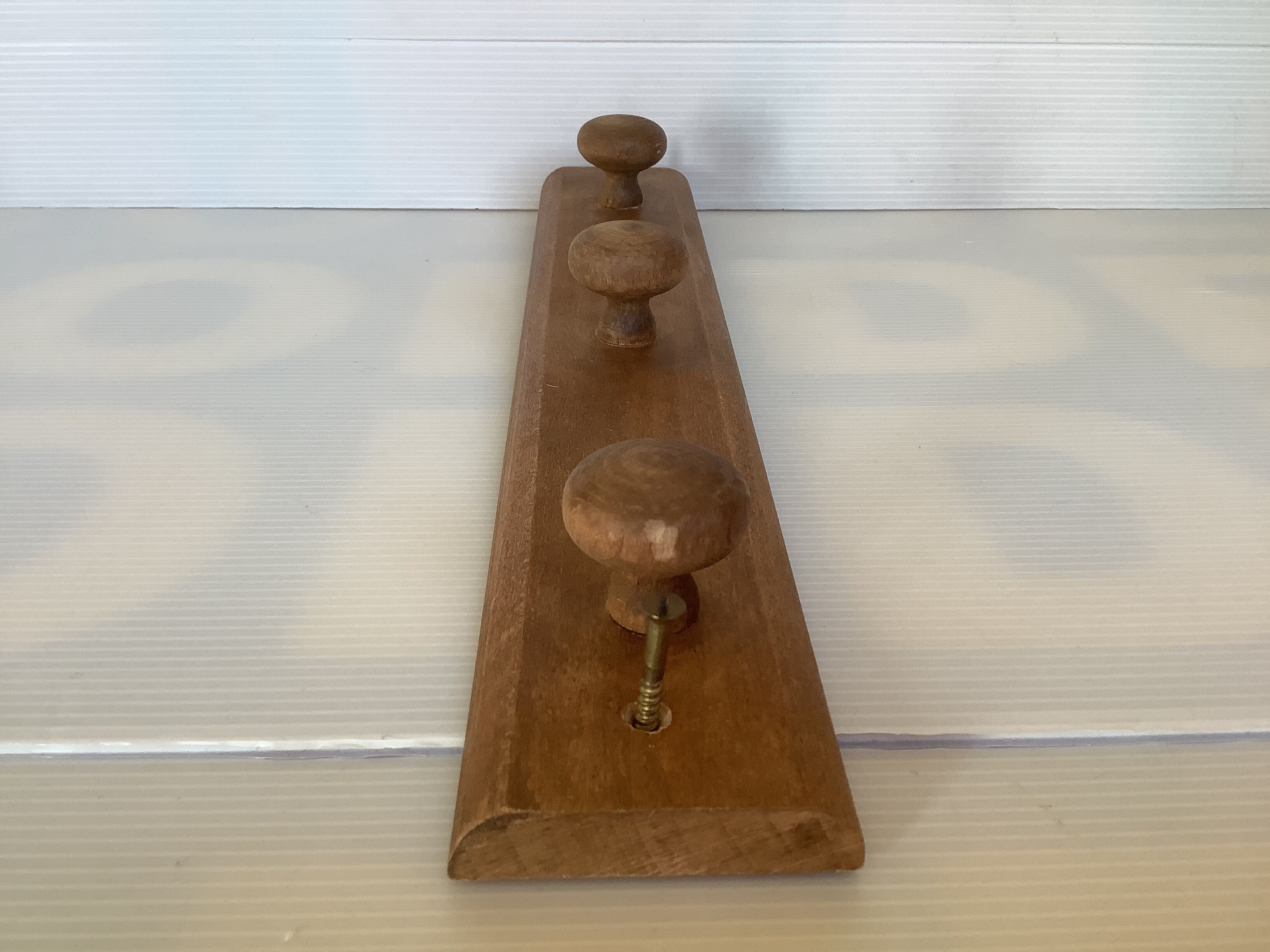 Wooden wall coat rack