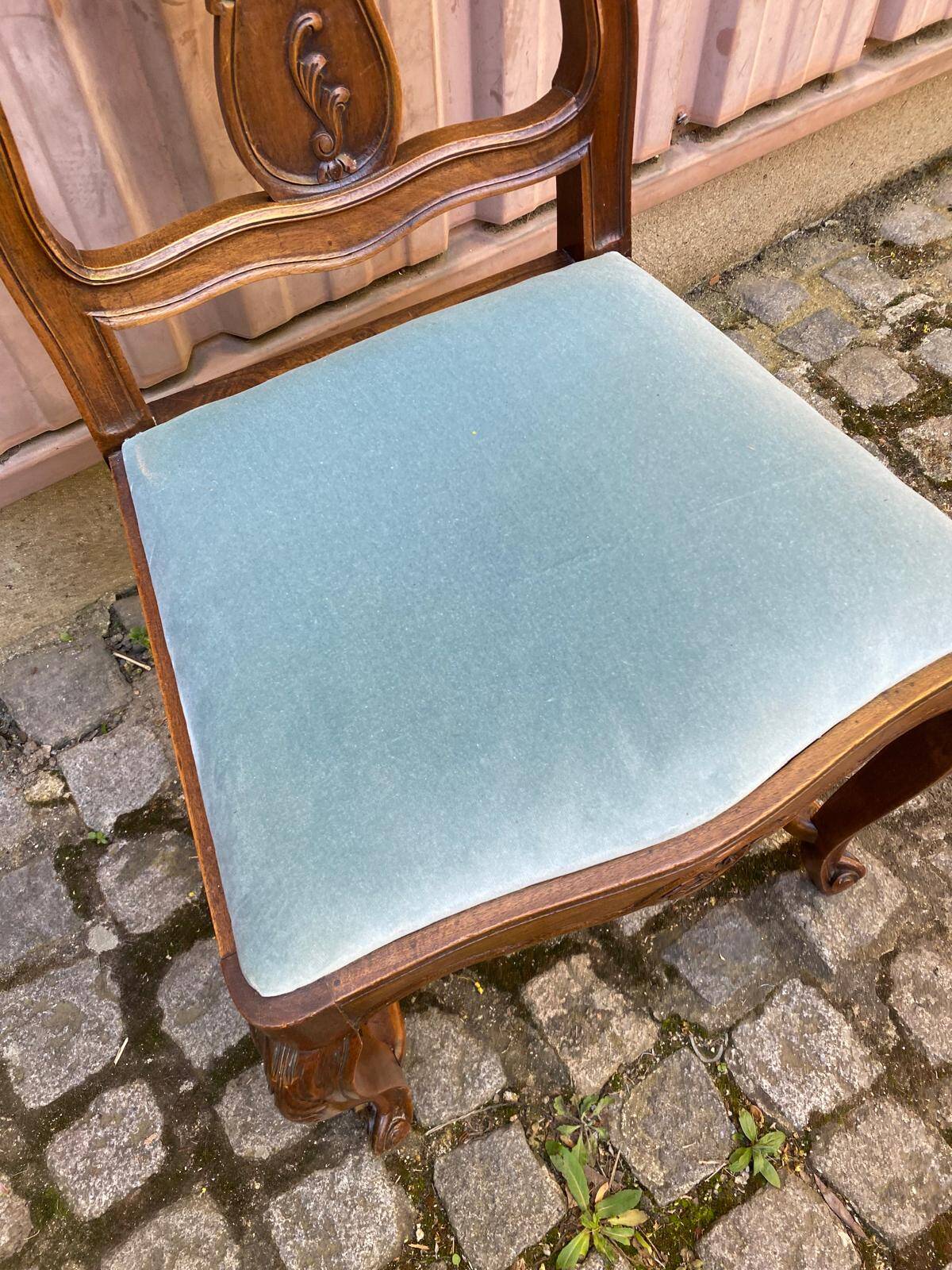 Vintage Louis XV chair made of carved solid wood with blue velvet fabric.