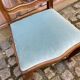 Vintage Louis XV chair made of carved solid wood with blue velvet fabric.