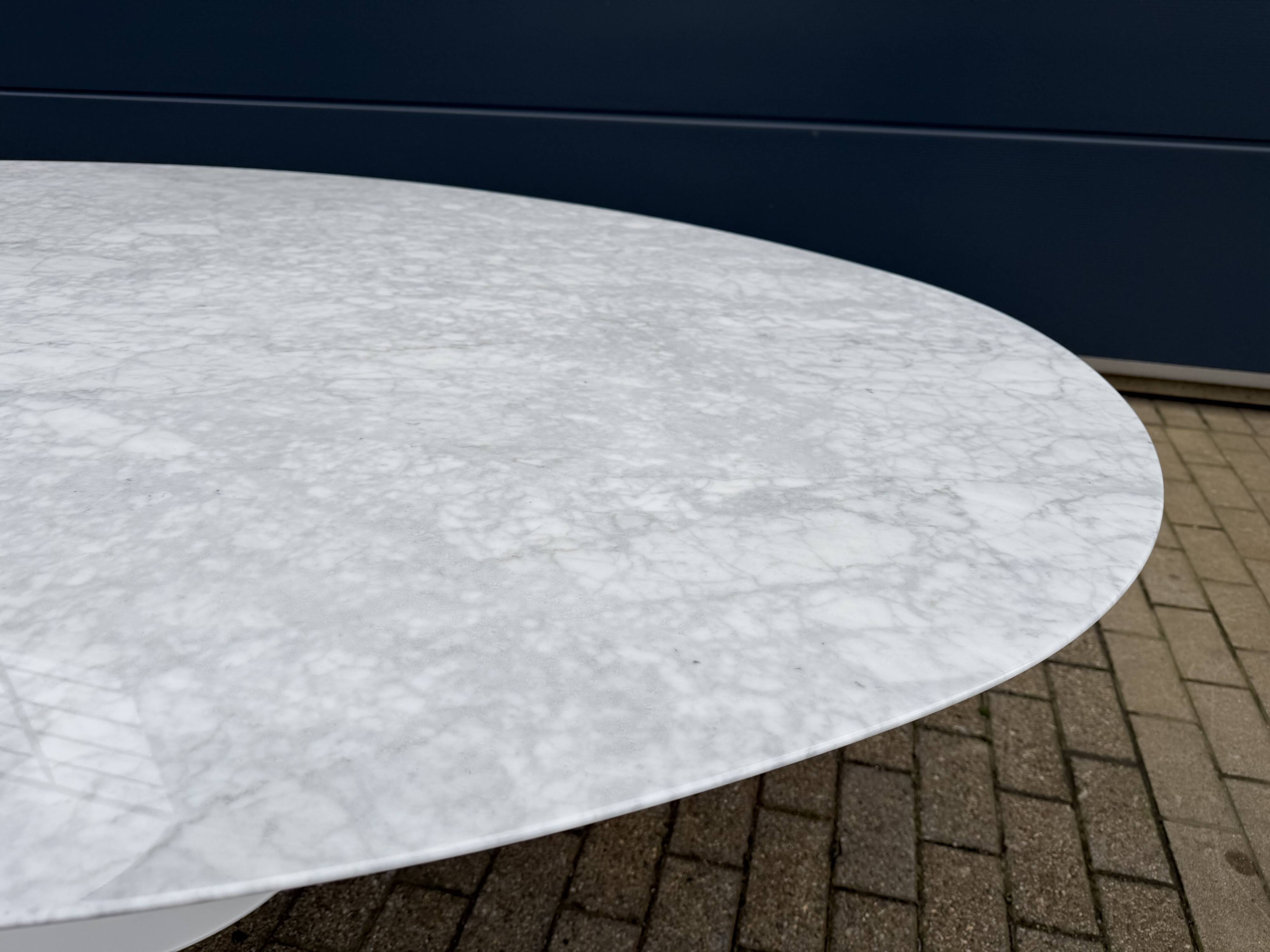 Original Knoll Tulip oval dining table (244cm) in Carrara marble.