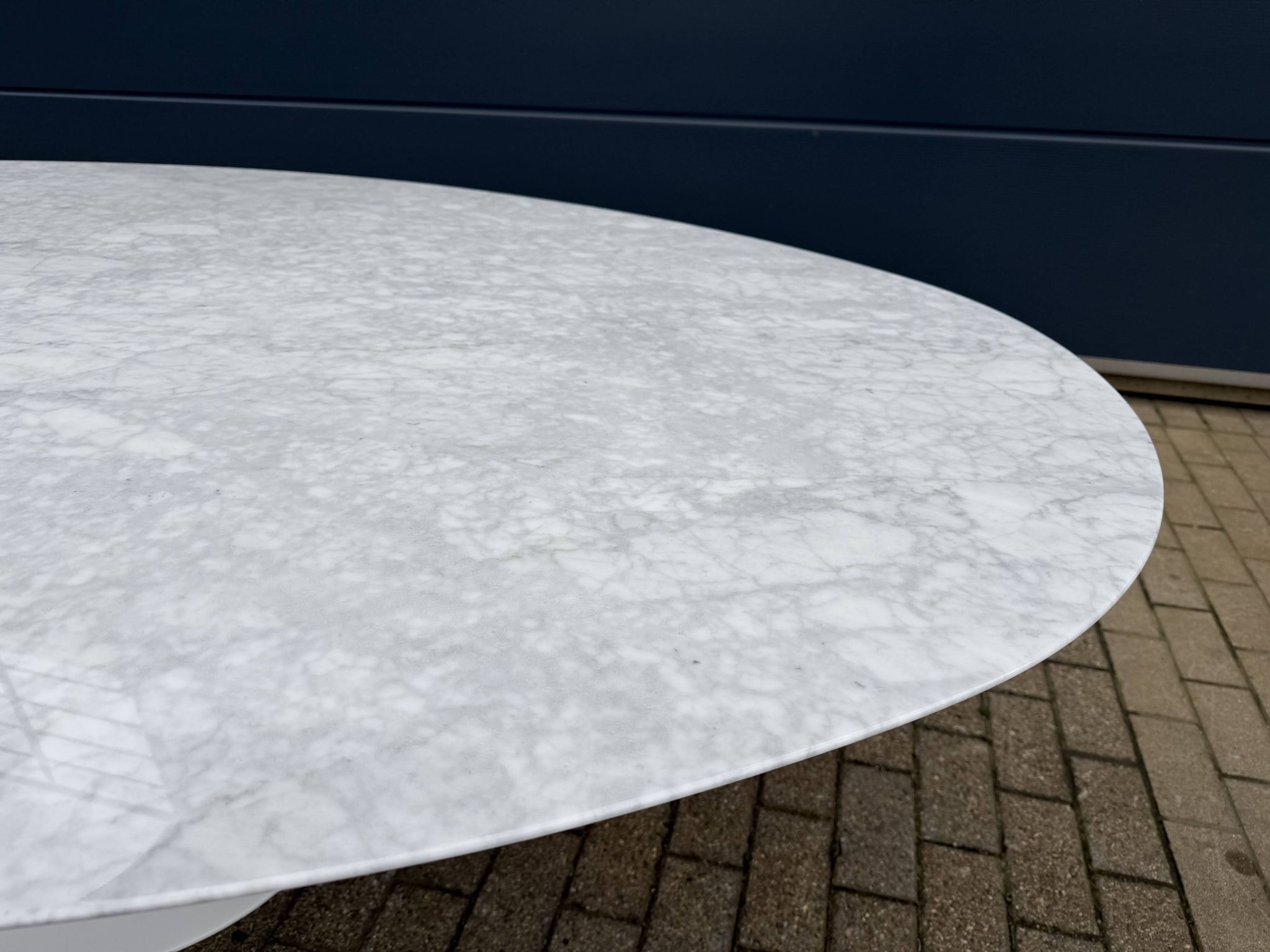 Original Knoll Tulip oval dining table (244cm) in Carrara marble.