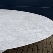 Original Knoll Tulip oval dining table (244cm) in Carrara marble.