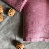 Set of four old damasked towels dyed cyclamen