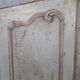 Pair of Louis XV period walnut and ash cabinet doors