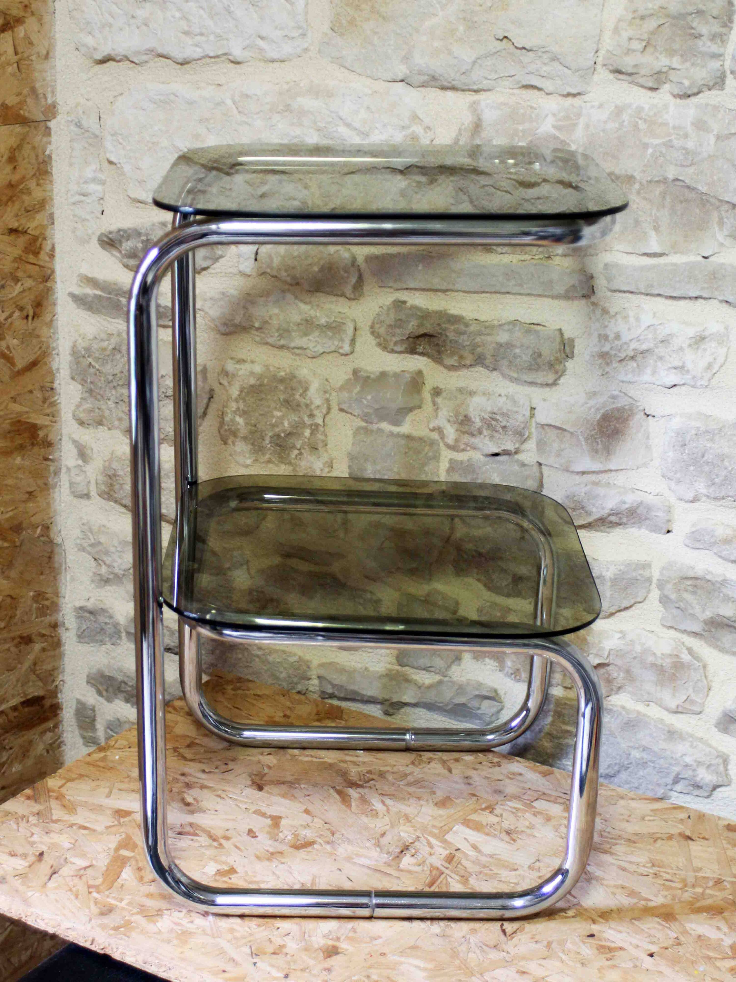 Chrome metal and smoked glass side table.