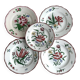 5 plates with colorful Sarreguemines floral designs.