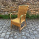 Fauteuil en rotin avec accoudoirs