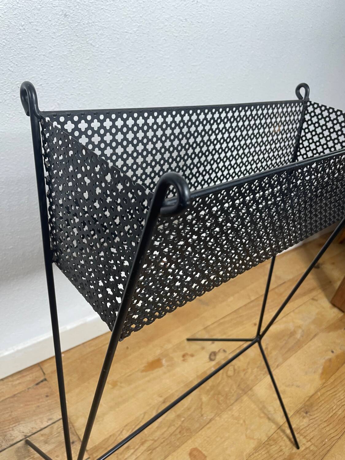 1950s black perforated metal planter in the style of Mathieu MATEGOT