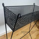 1950s black perforated metal planter in the style of Mathieu MATEGOT