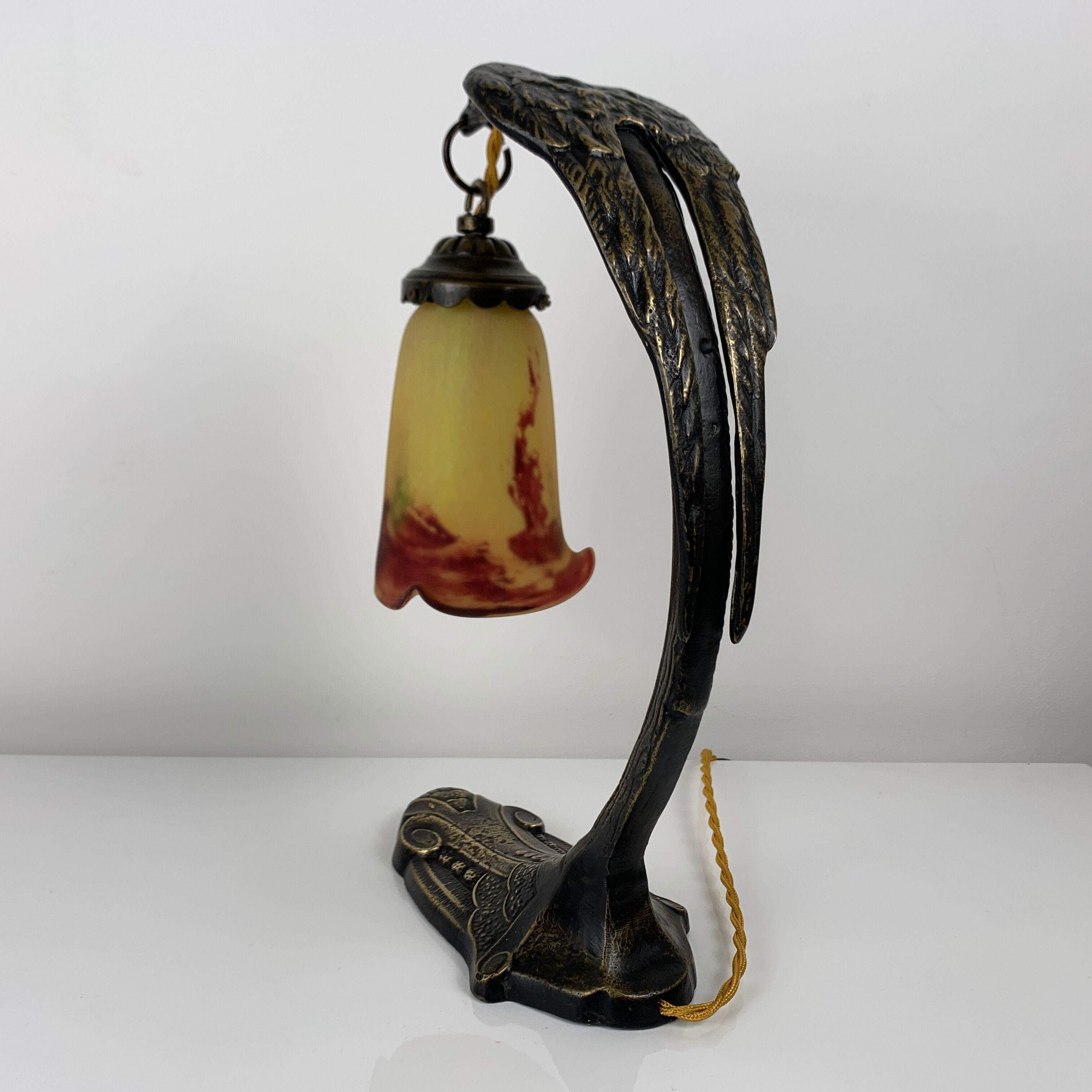 Bronze eagle lamp patinated and Art Nouveau style glass pate