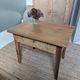 Small antique wooden coffee table with drawer, country style.