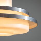 Doria pendant in opal glass with decorative aluminium discs