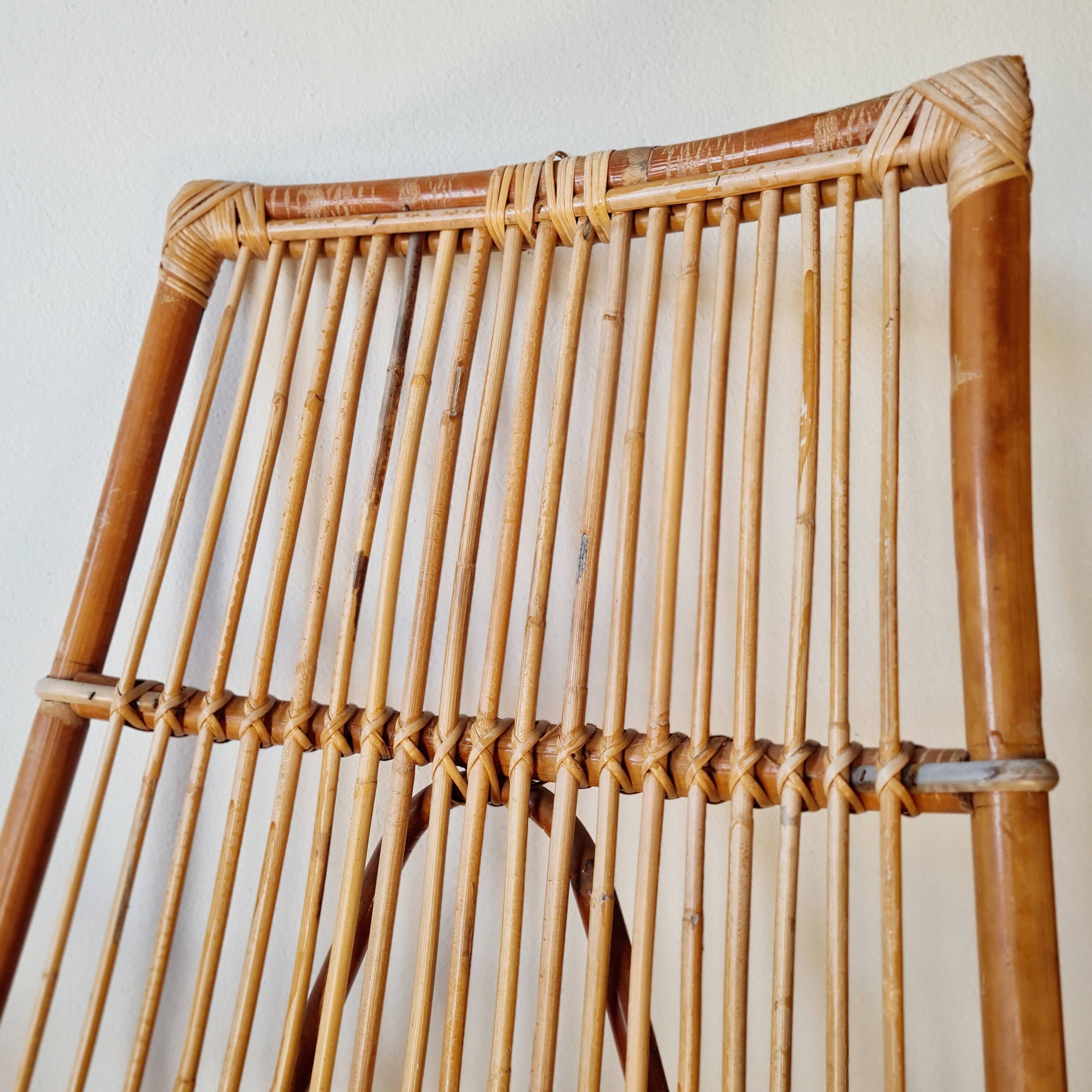 Fauteuil ancien en rotin large dossier