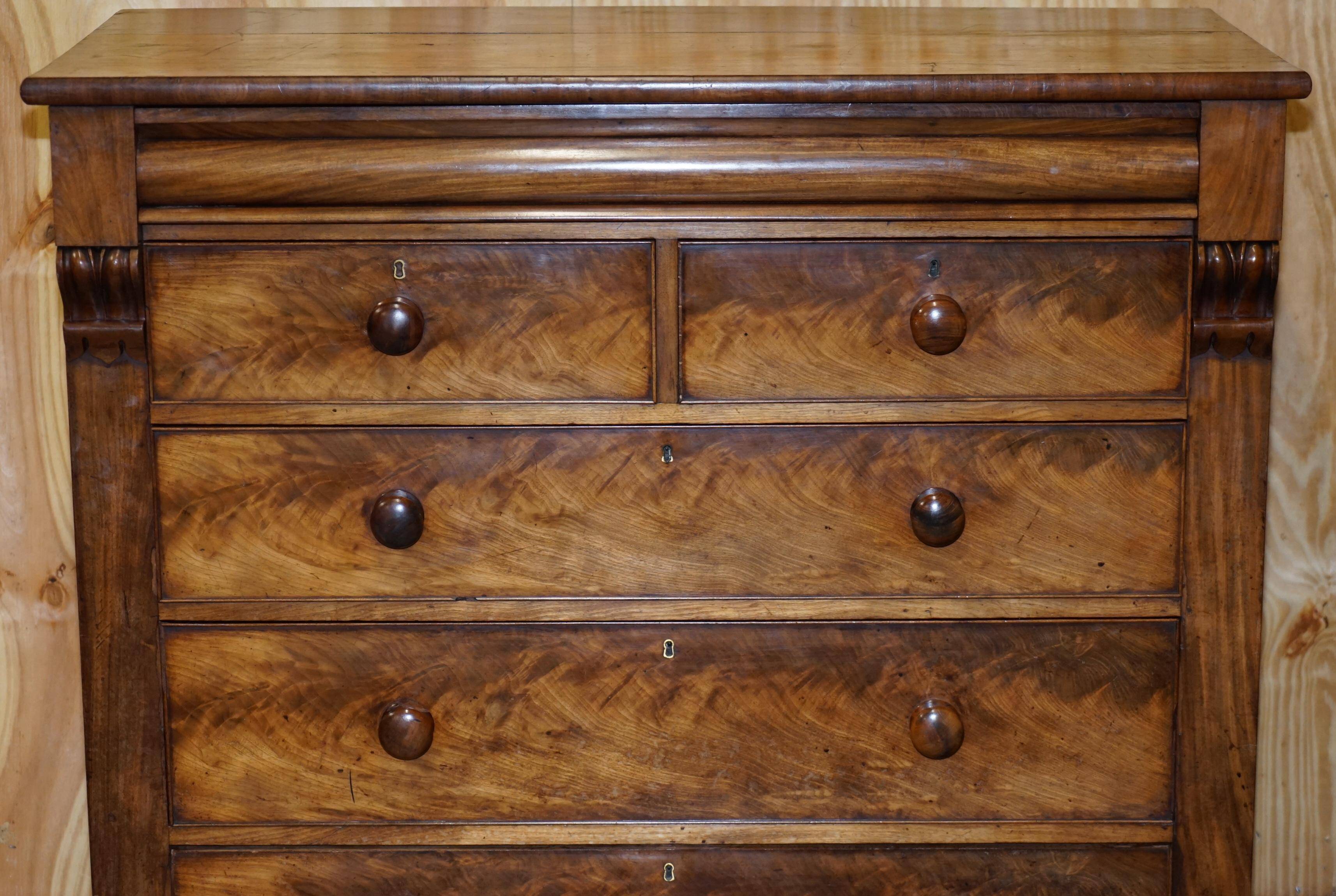 Victorian flamed hardwood commode from the 19th century with a hidden drawer.