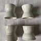 Set of 4 white porcelain diabolo shells