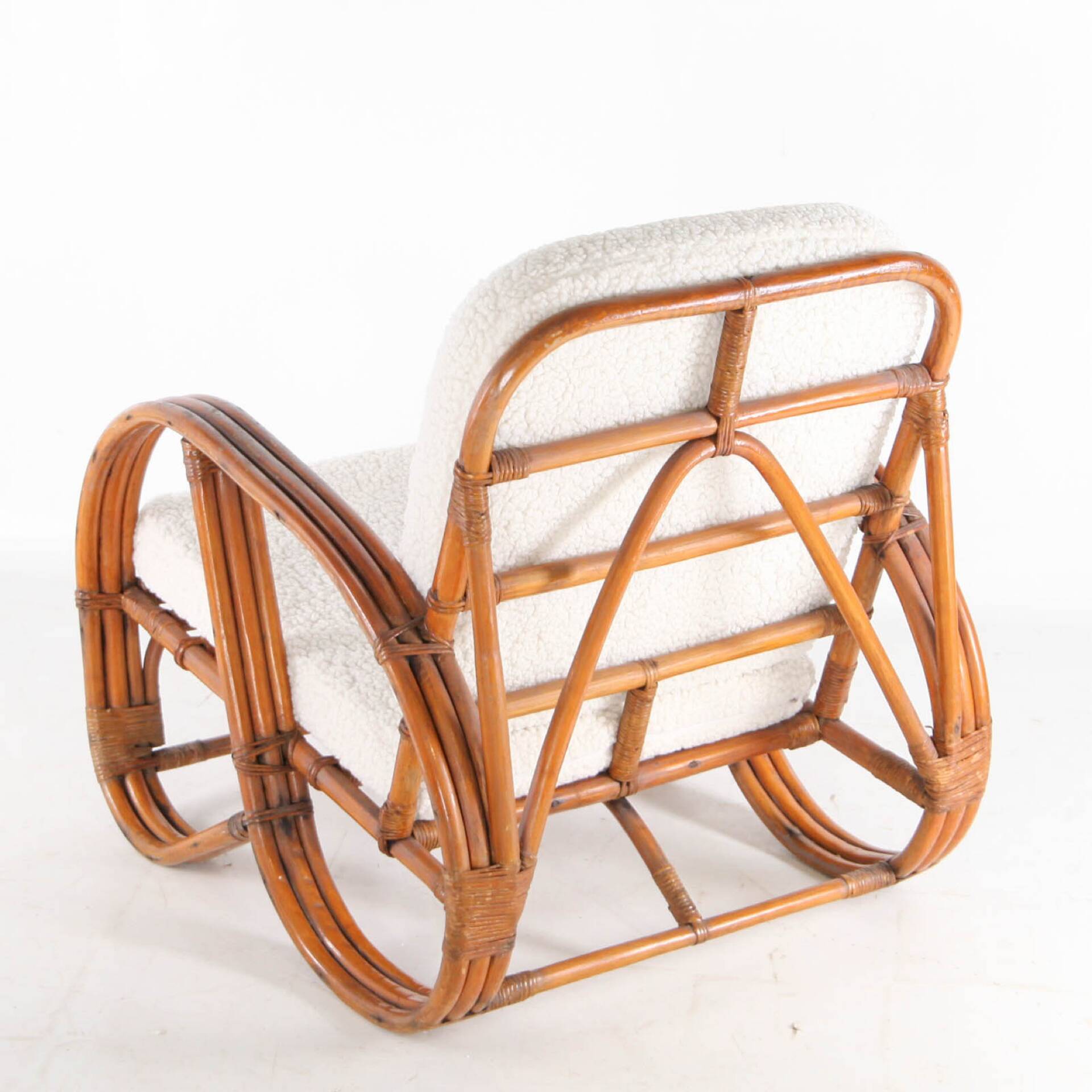 "Bretzel" armchair in rattan