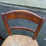 2 solid wood chairs with rush seats, child size.
