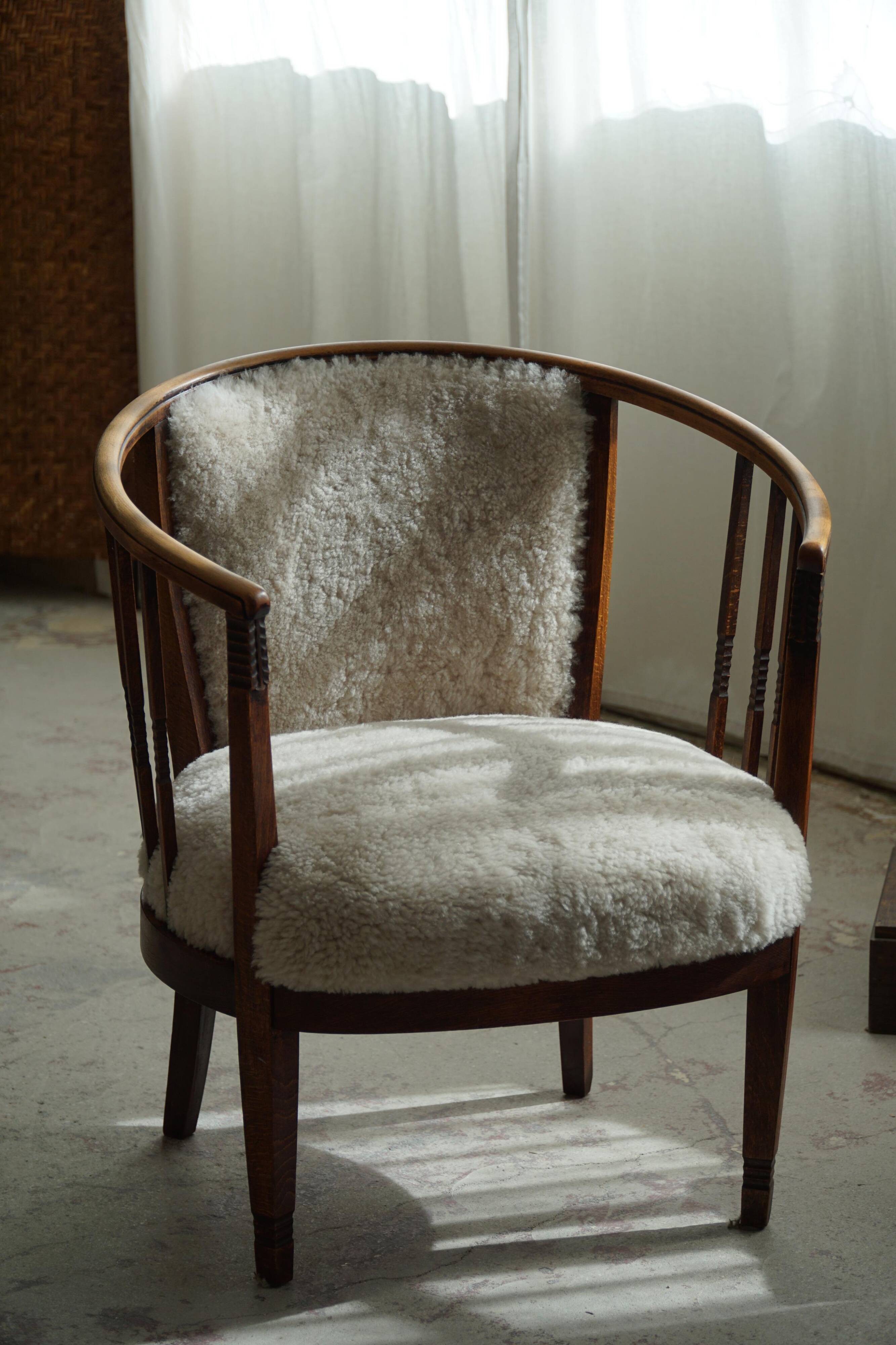 Pair of Danish armchairs in beech, reupholstered in lambswool, Art Nouveau, 1900s.
