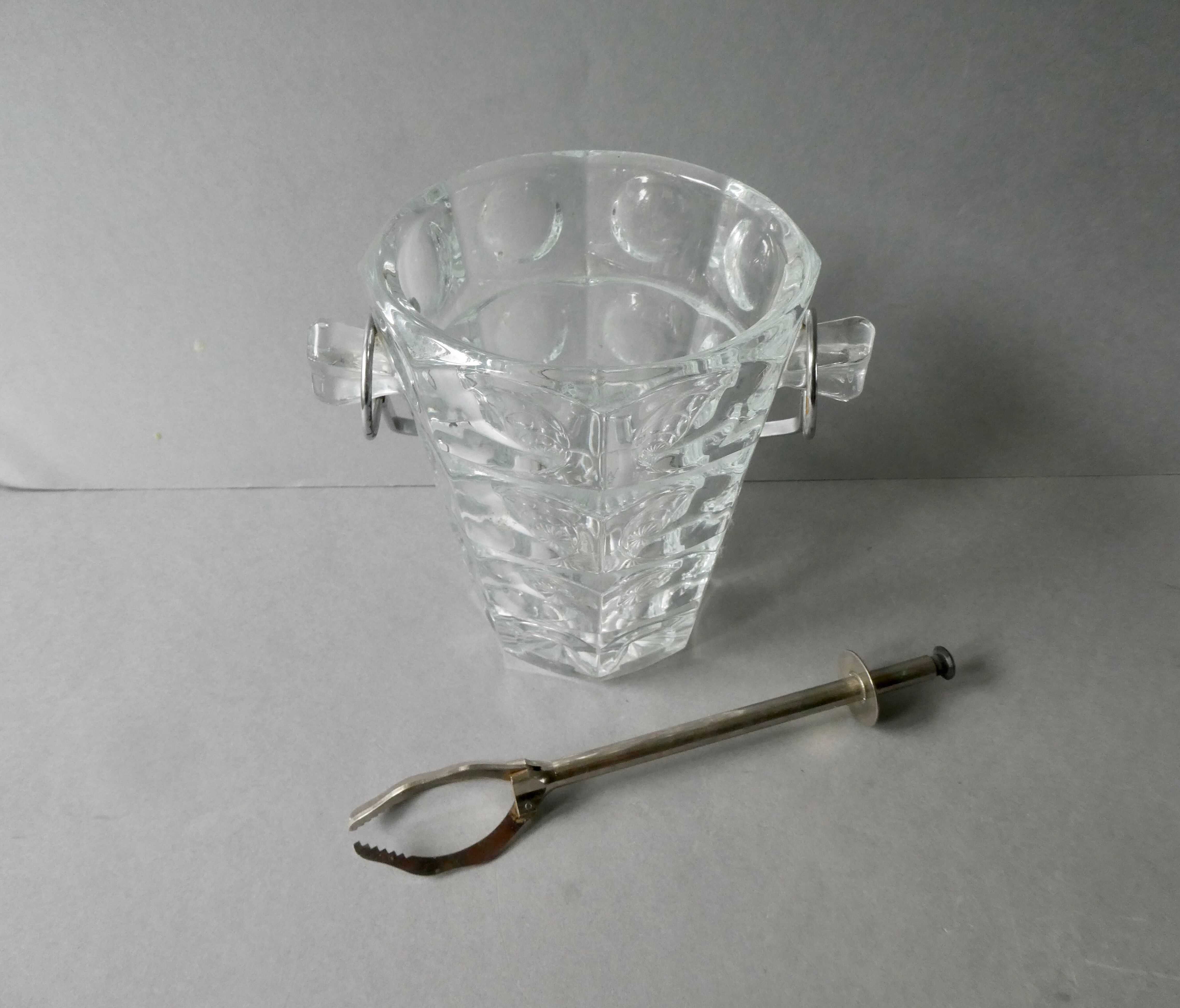 Cut glass ice bucket and its pliers
