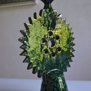 Green ceramic sun candlestick from Tamegroute, Morocco.