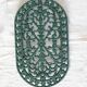 Vintage dark green cast iron oval trivet - Openwork design