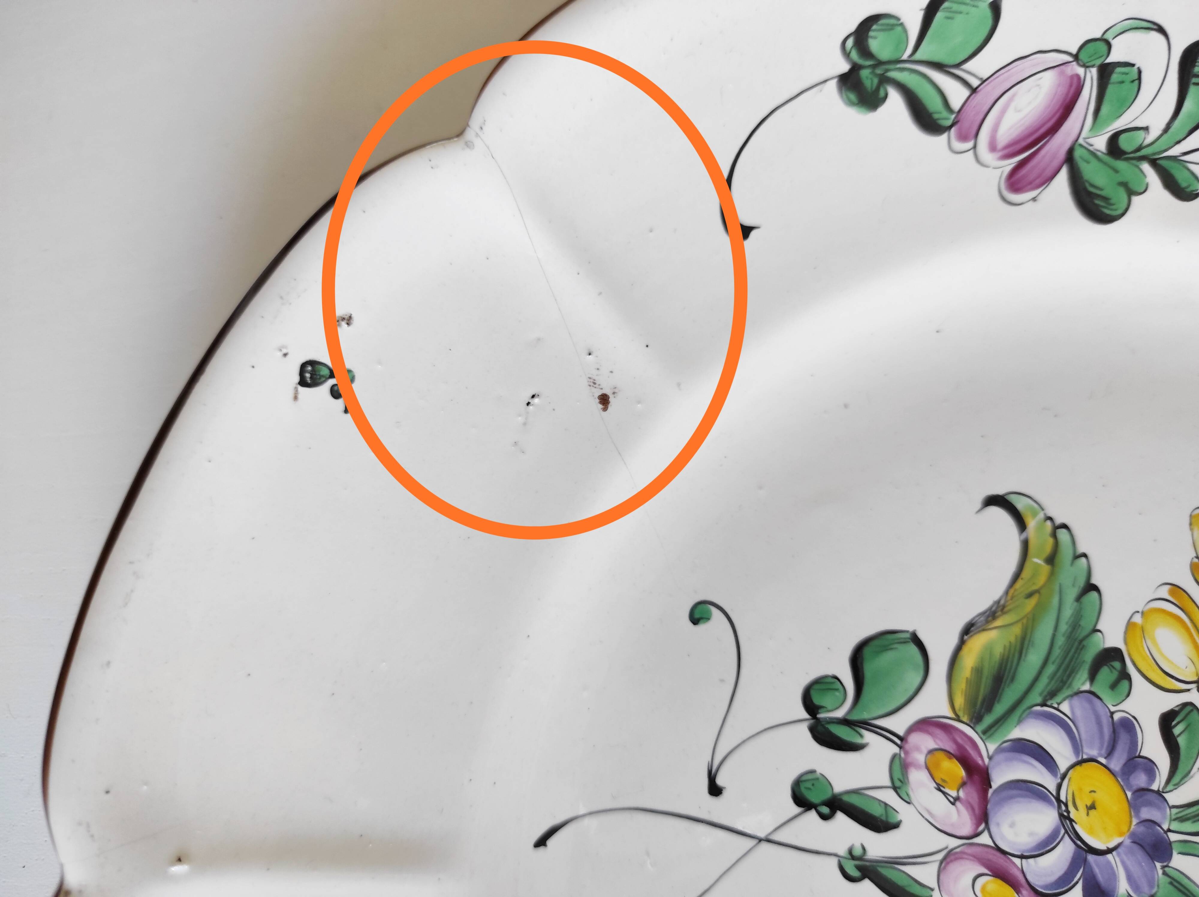 Eastern earthenware plate with flowers