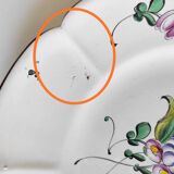 Eastern earthenware plate with flowers