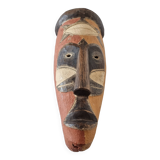 Wooden mask baule carved and hand painted with natural pigments from ivory coast