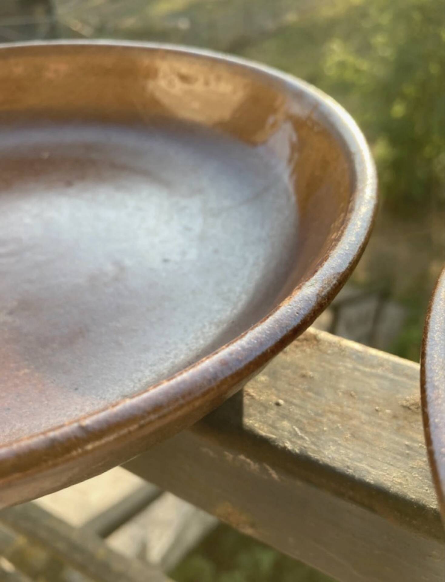 Deep plates made of organic, wild, earthy marsh clay.