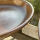 Deep plates made of organic, wild, earthy marsh clay.